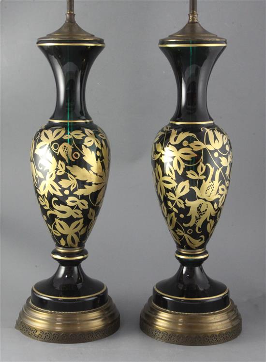 A pair of Bohemian gilt glass table lamps, overall height 35in.